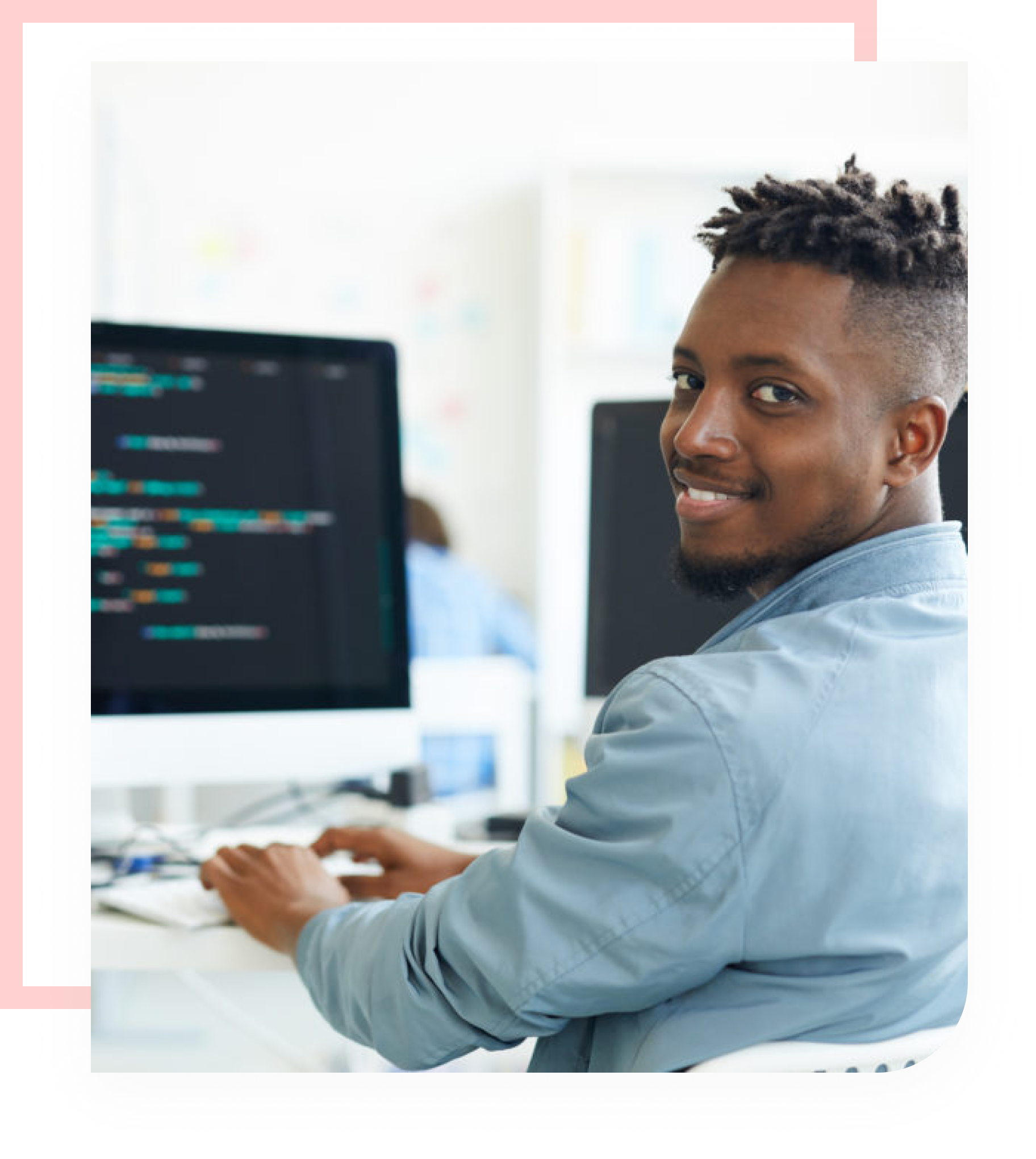 Black man on a computer